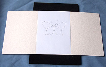 Step 1 lay your blank card onto the pricking mat